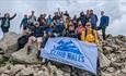 A London Legal Firm at the top of Cadair Idris during a Welsh 3 Peaks Challenge