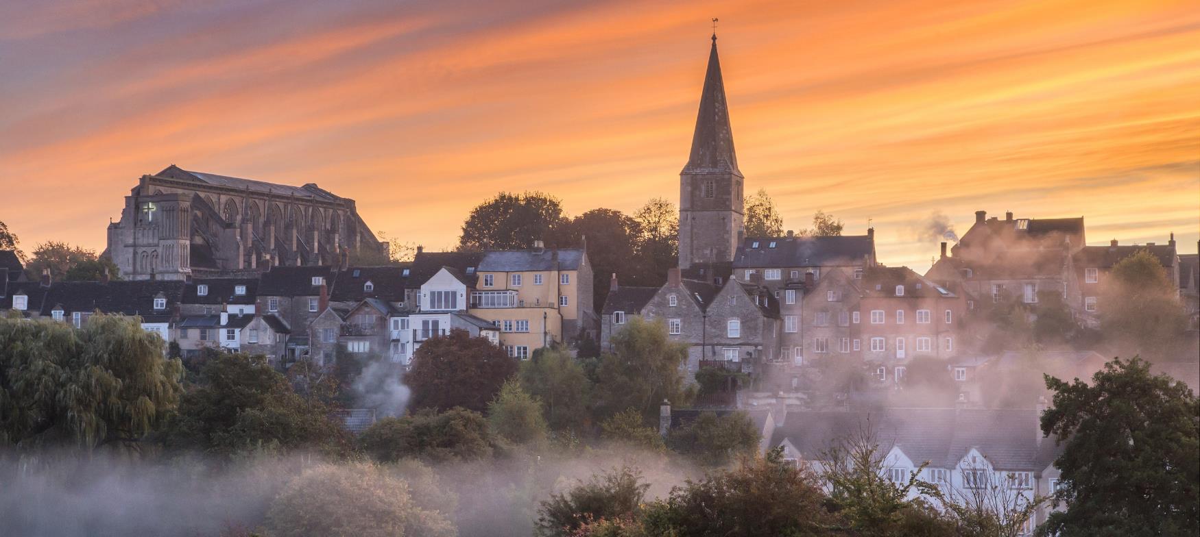 Malmesbury in the mist at sunrise, credit Robert Peel