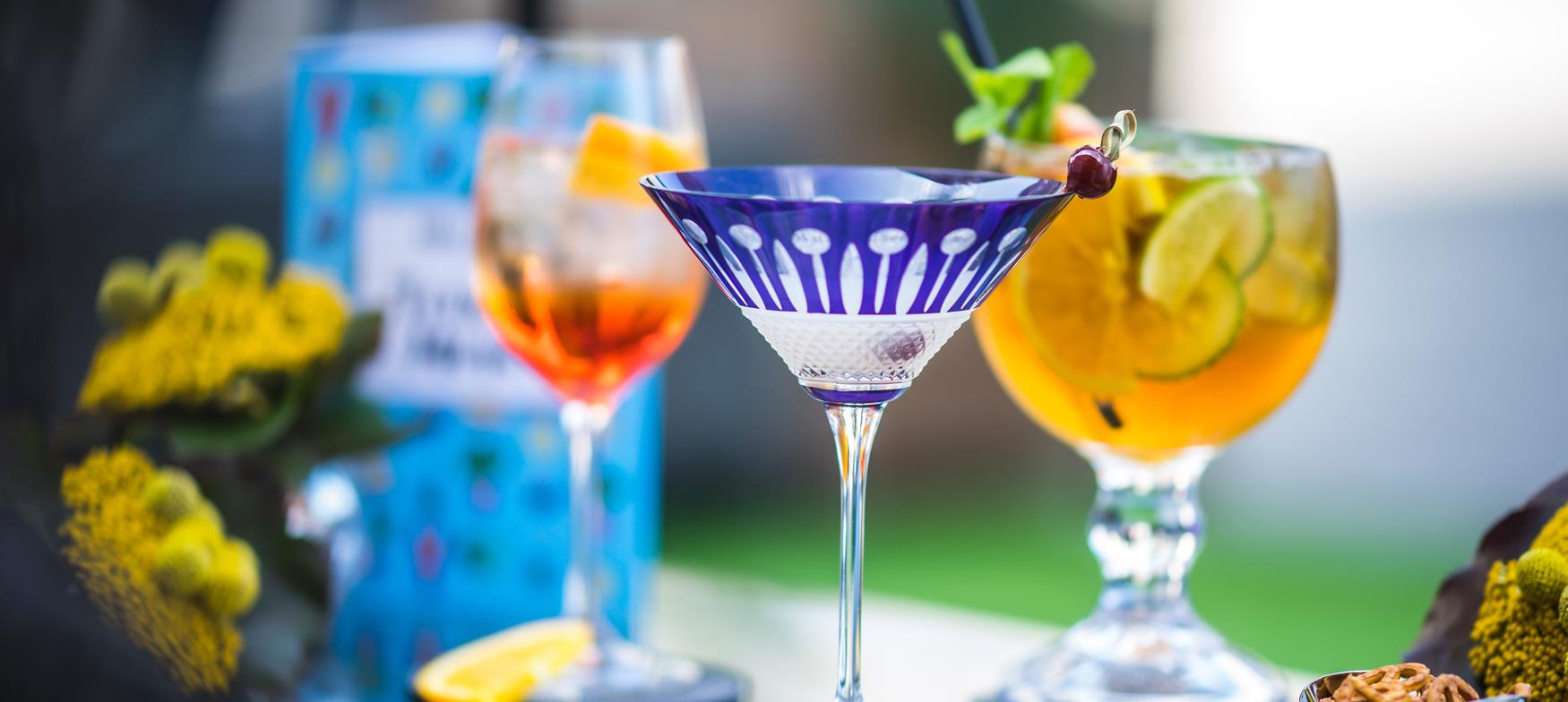 Cocktails in colourful glasses