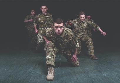 Five Soldiers looking directly at the camera