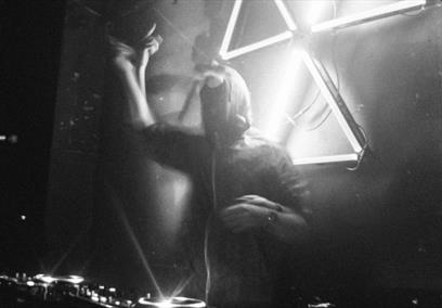 A black and white picture of a dj