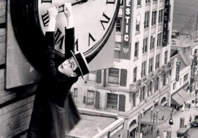Harold Lloyd hanging from a clock