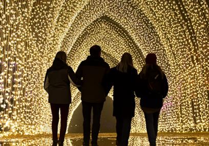 Family exploring tunnel of light