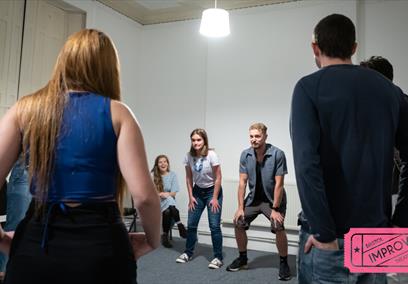 People engaging in improv at Bristol Improv Theatre