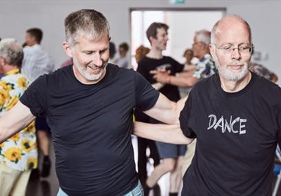 Two men dancing