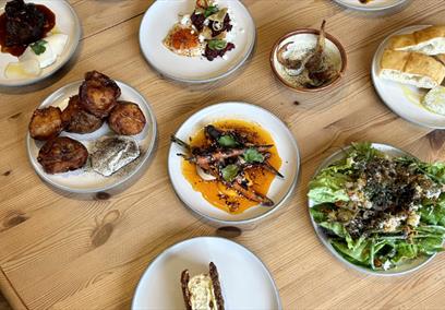 An array of food on a wooden table