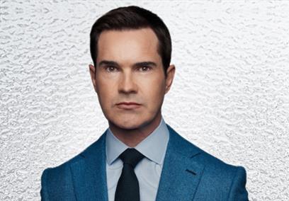 Jimmy Carr wearing a blue suit