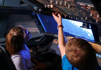 children in aircraft simulator