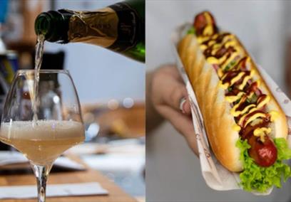 A picture of champagne and a hot dog