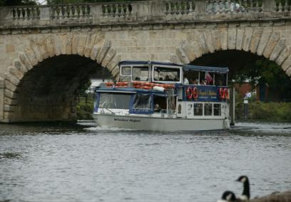 French Brothers boat sails under Maidenhead bridge