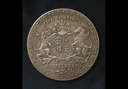 An old five shillings coin