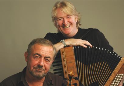 Phil Cunningham & Aly Bain posing together