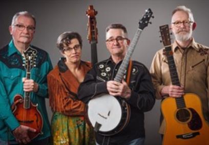 4 musicians holding instruments