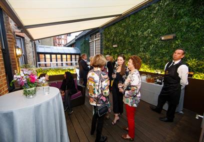 People socialising at Cliveden Literary Festival