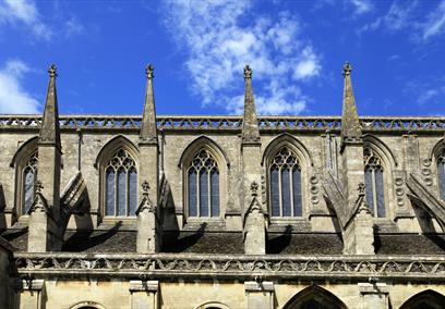 blue skies behind abbey windows