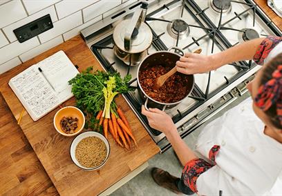 An ariel view of someone cooking in the kitchen