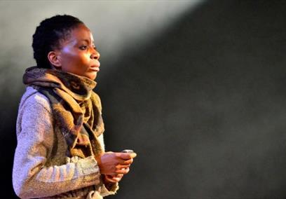 Woman stood on stage