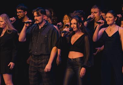 A choir performing on stage