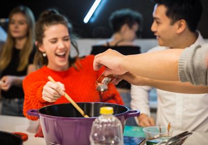 People enjoying a cooking class