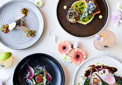4 plates of food with a spring theme