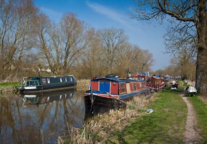 canal boats moored up on the edge of the canal