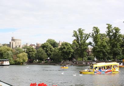 Windsor Duck Tours on River Thames with Windsor Castle in distance