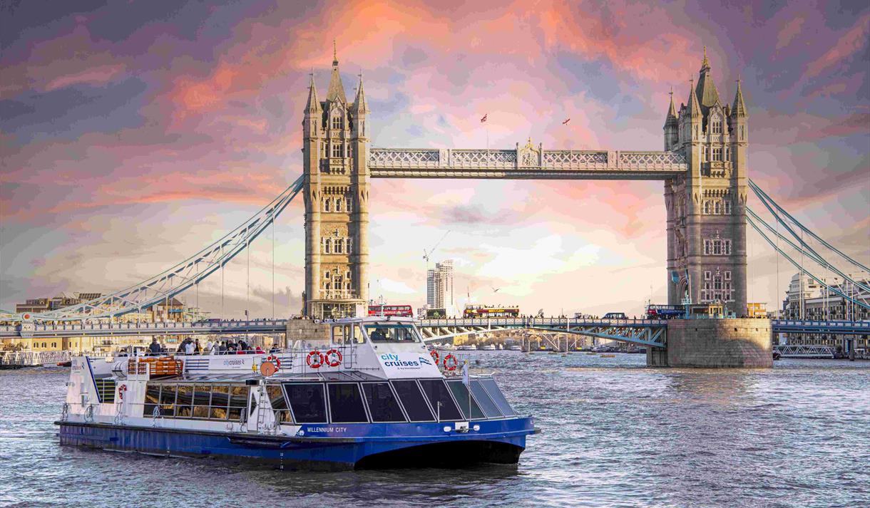 City Cruises boat in front of Tower Bridge, River Thames