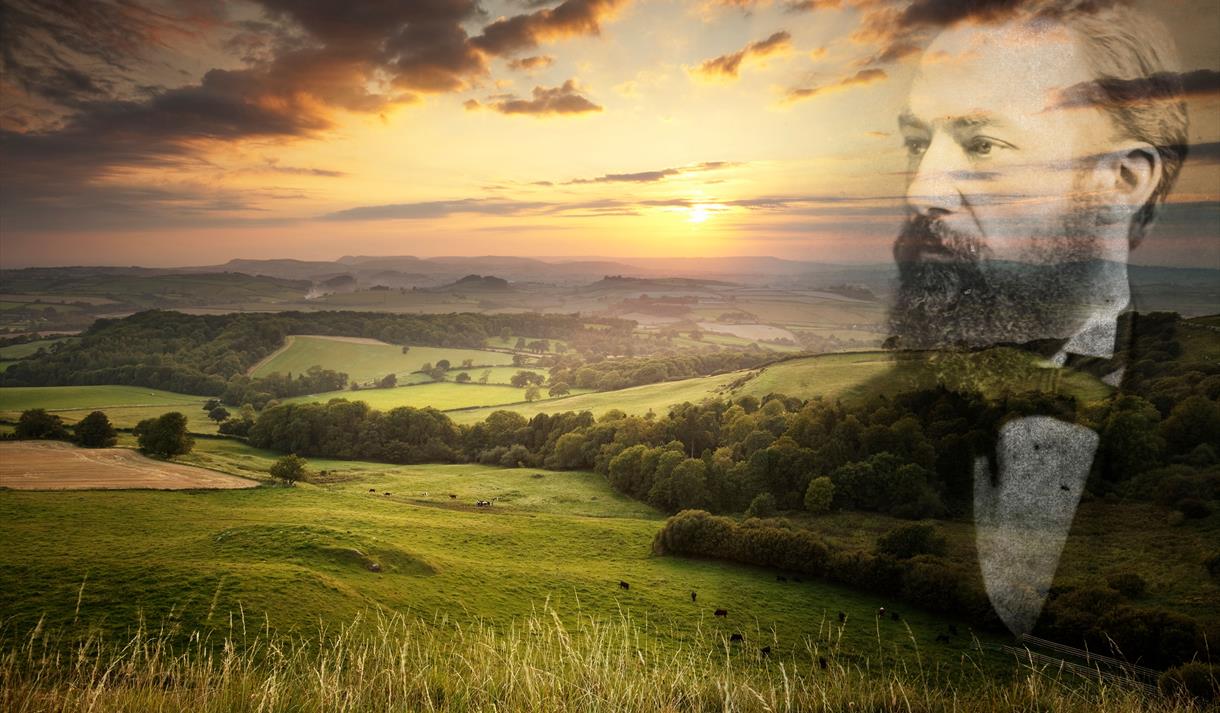 Thomas Hardy in front of a wessex landscape