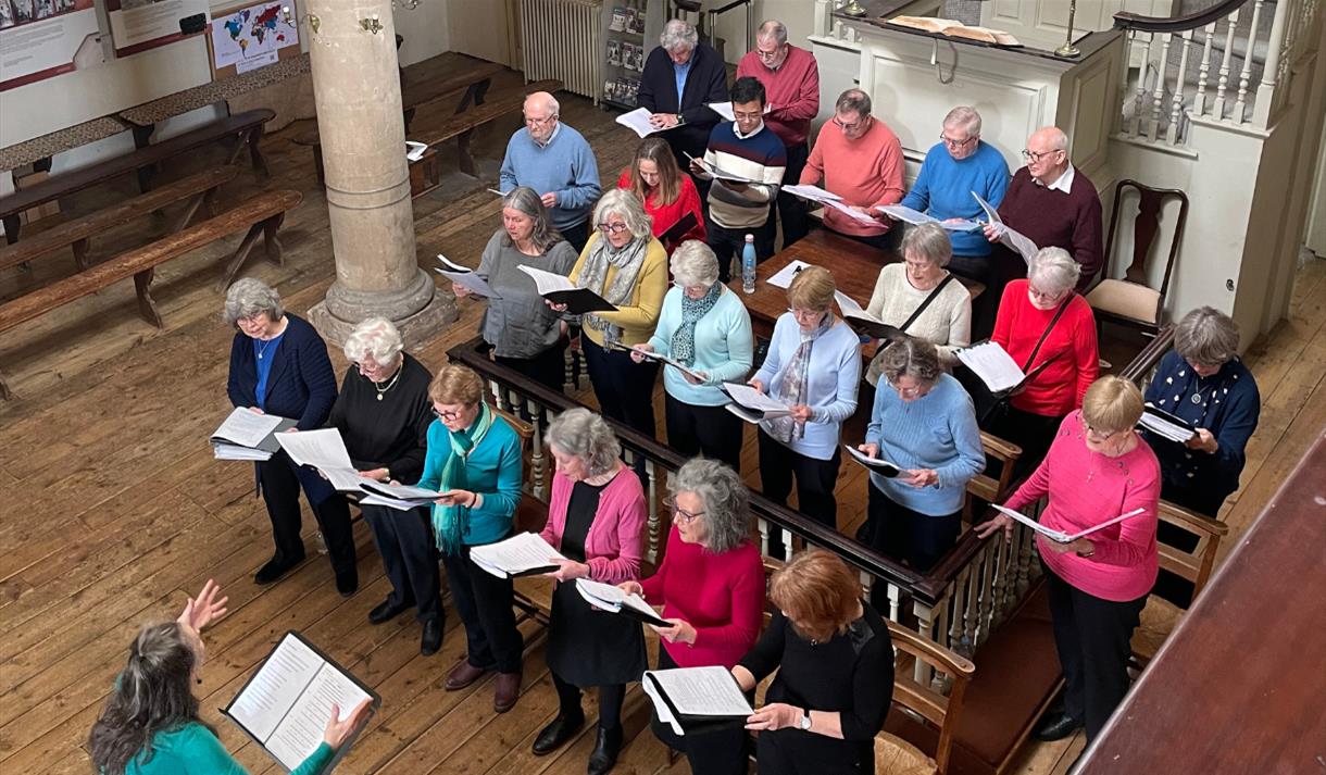 A choir singing in John Wesley's New Room