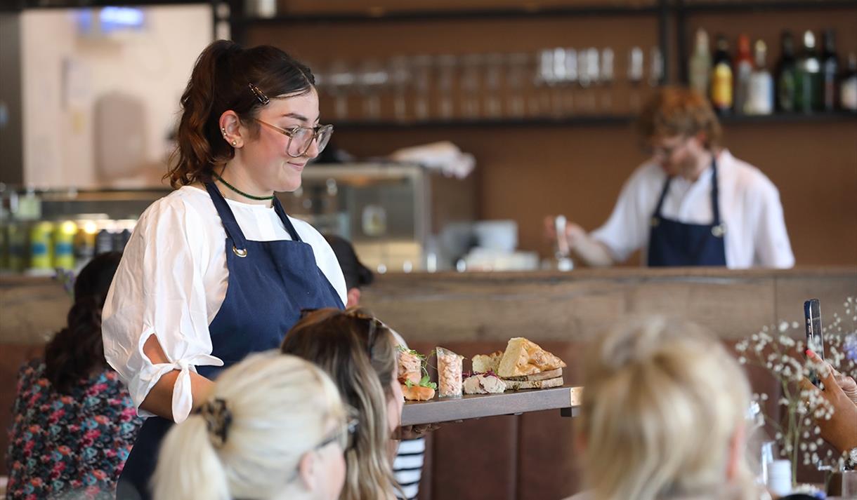Server serving food