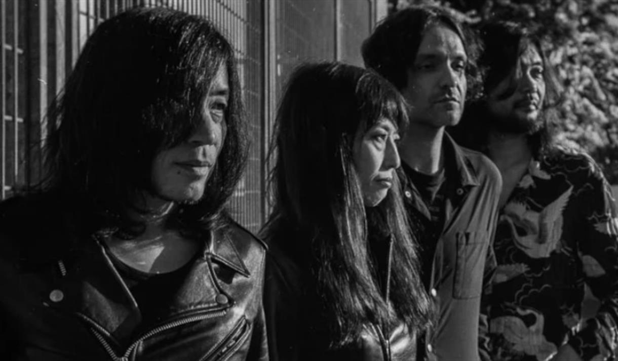 A black and white image of the band Mono