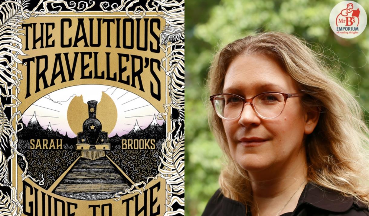 Author Sarah Brooks with her book The Cautious Traveller's Guide to the Wastelands
