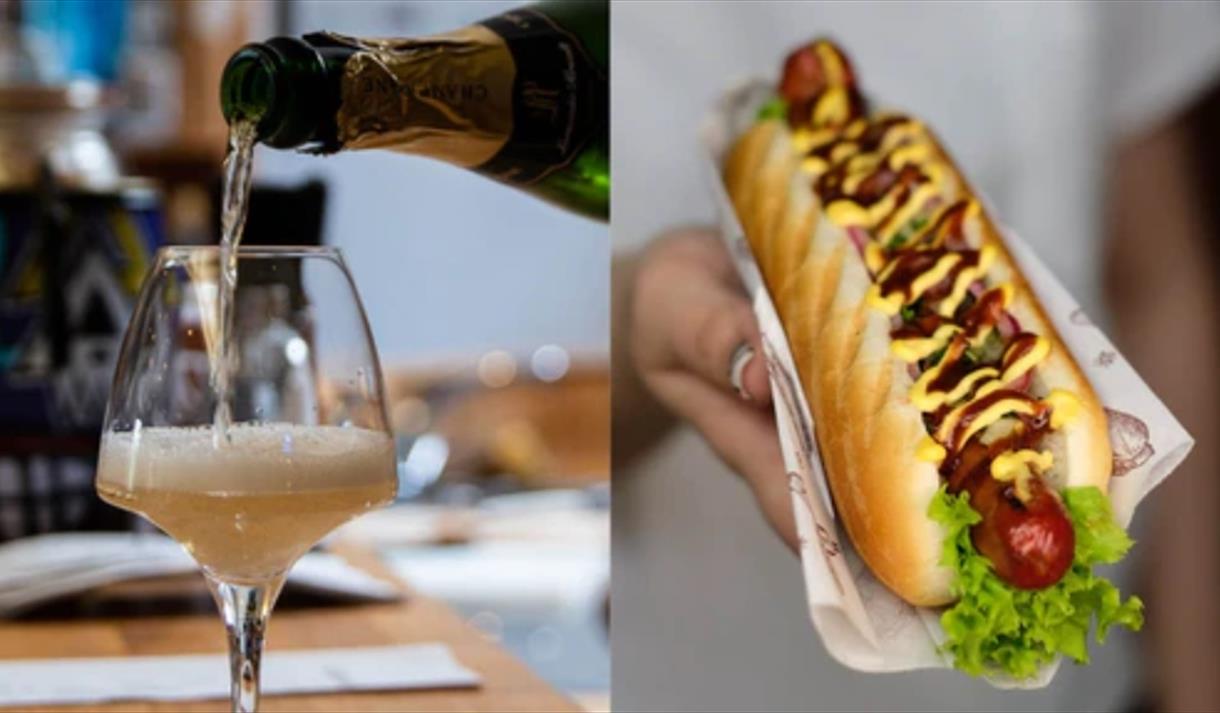 A picture of champagne and a hot dog