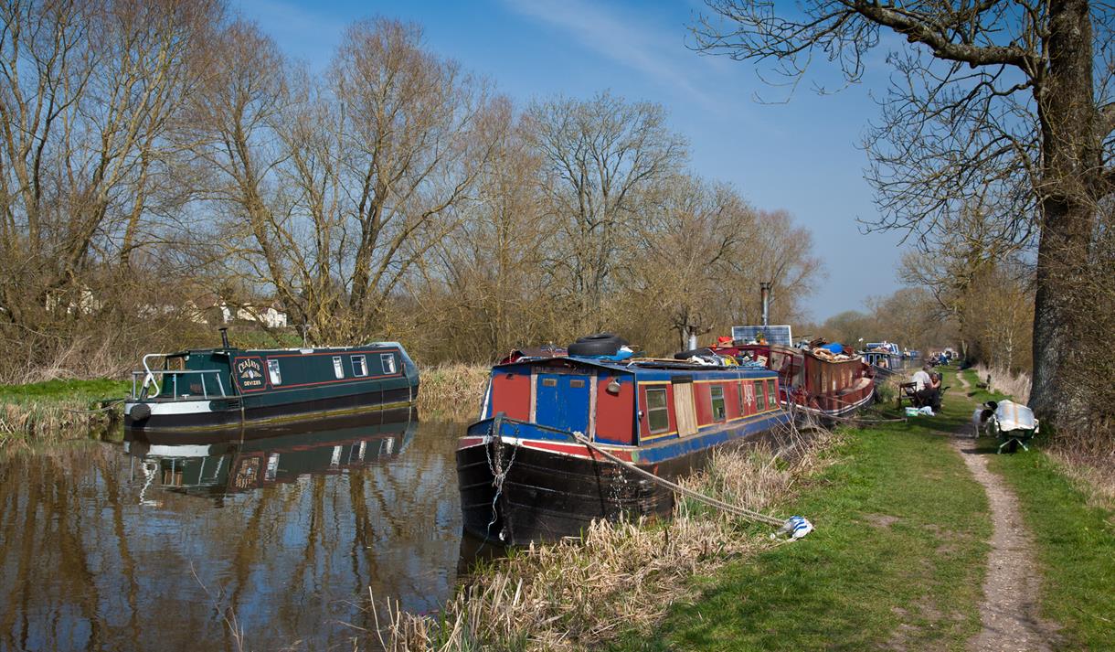 canal boats moored up on the edge of the canal