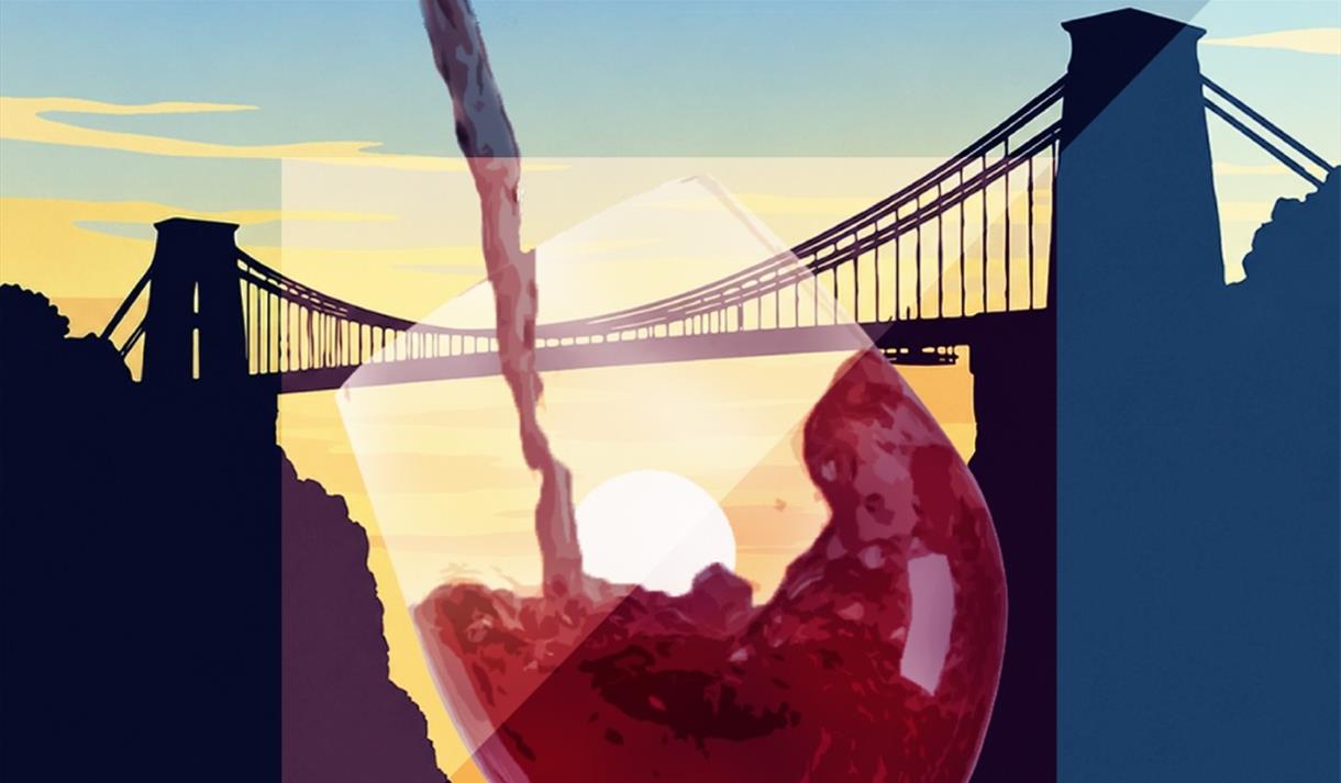 Red wine is poured into a glass against the backdrop of Clifton Suspension Bridge at sunset
