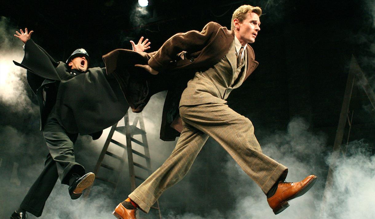 Policeman chasing a man
