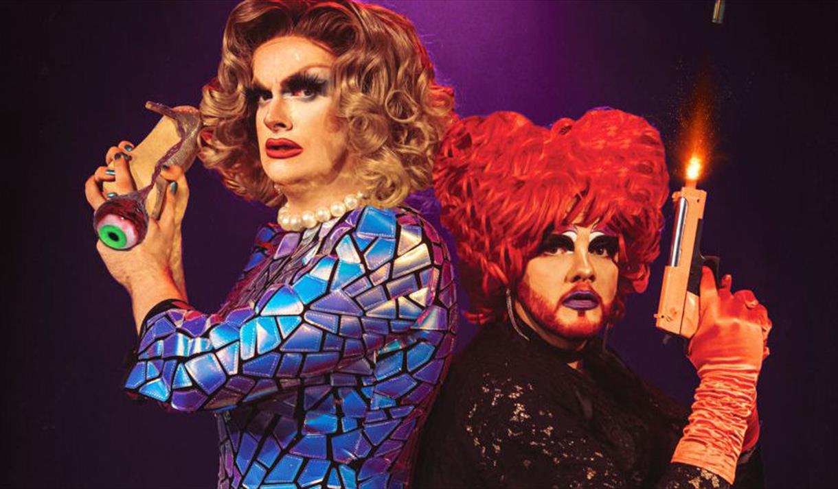 2 drag queens back to back