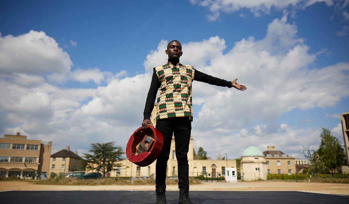 A portrait of John Pfumojena