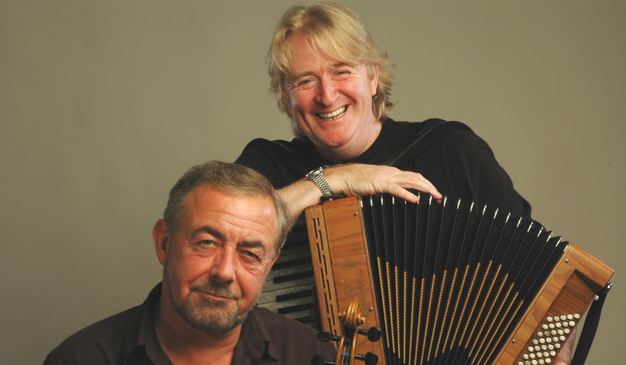 Phil Cunningham & Aly Bain posing together