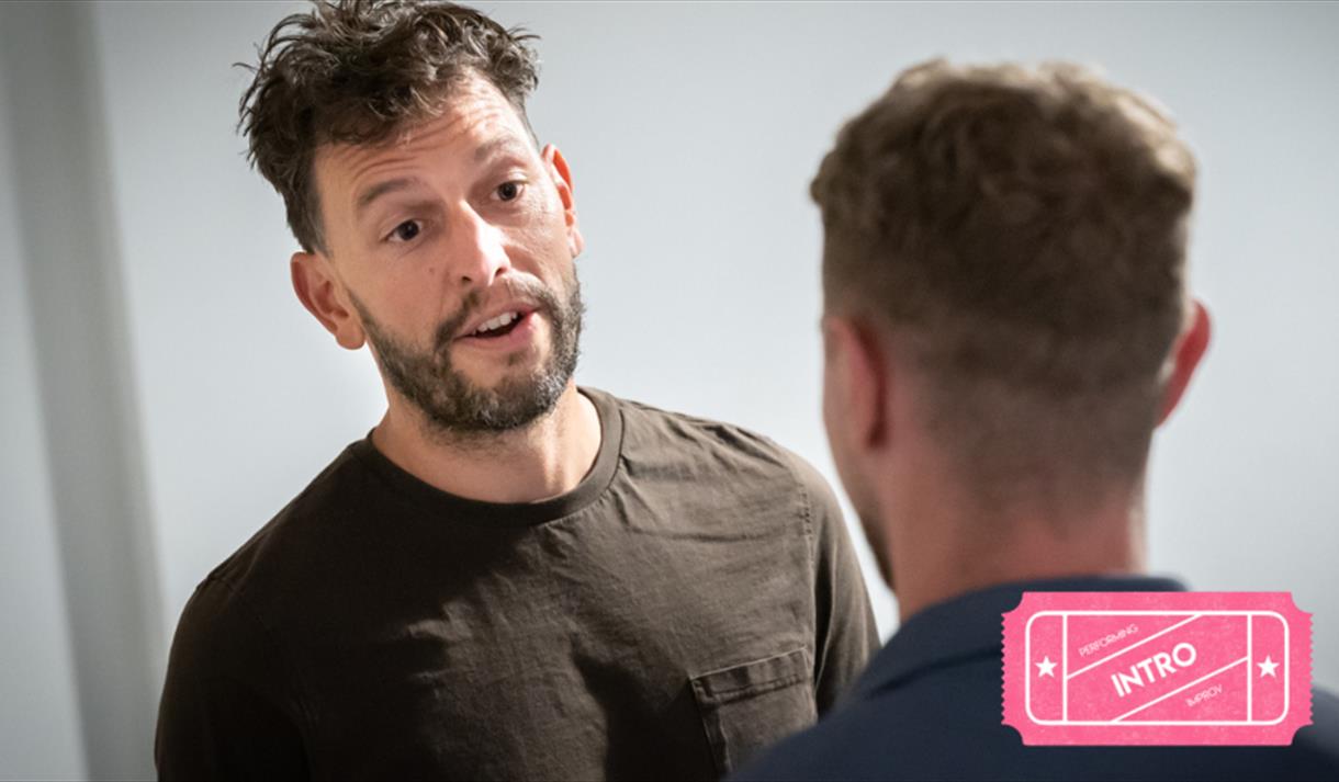 2 men engaging in improv theatre