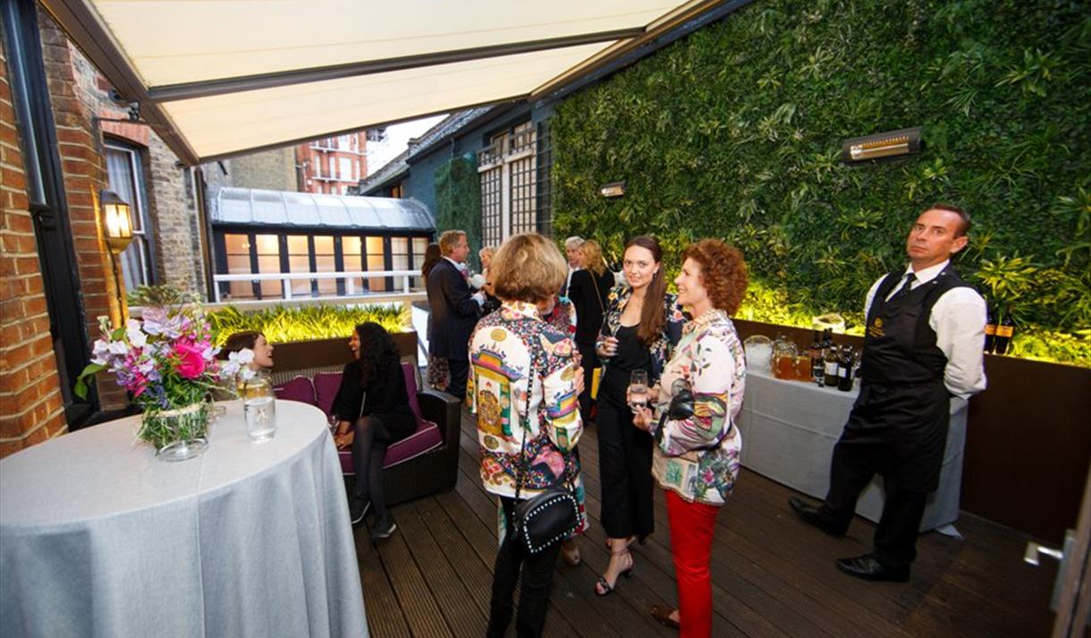 People socialising at Cliveden Literary Festival