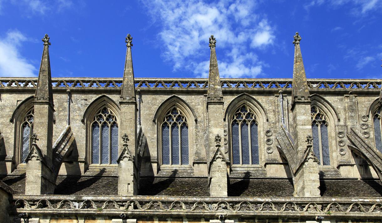 blue skies behind abbey windows