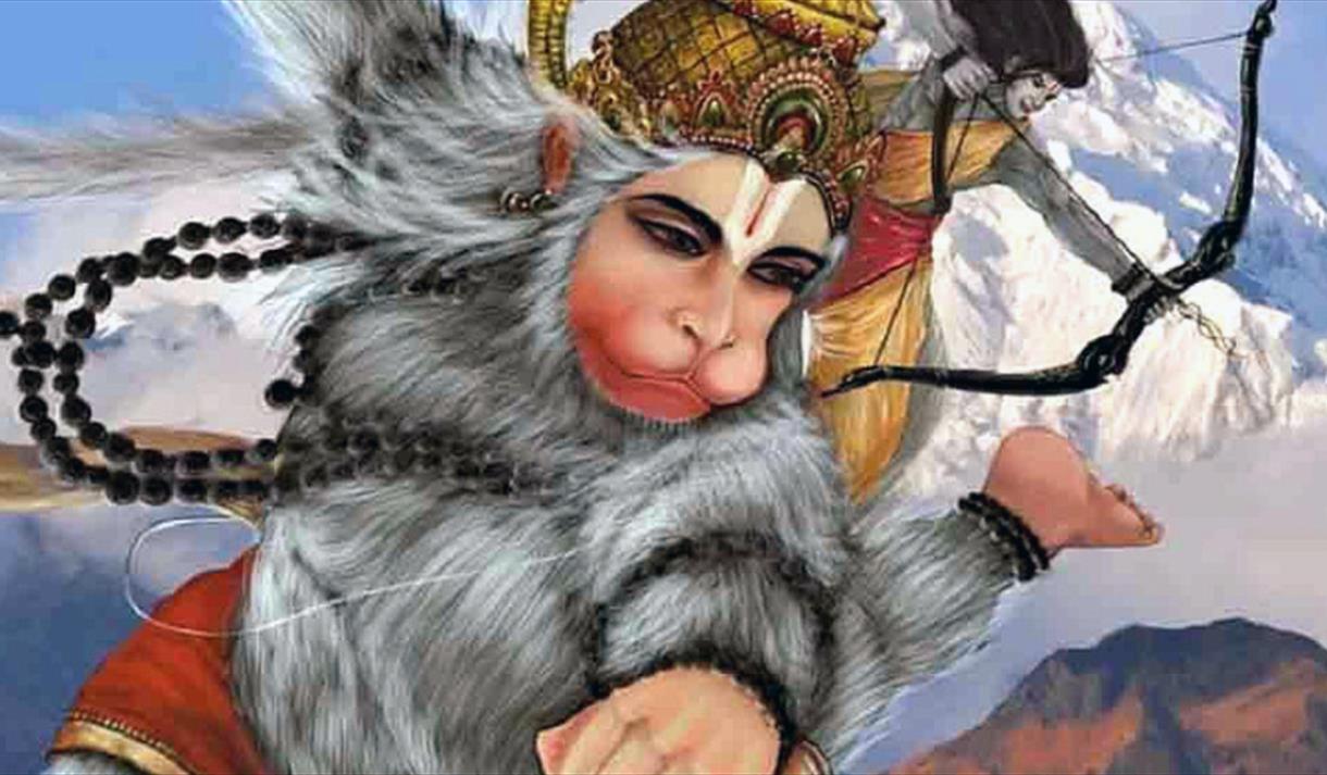 A flying monkey wearing a fez