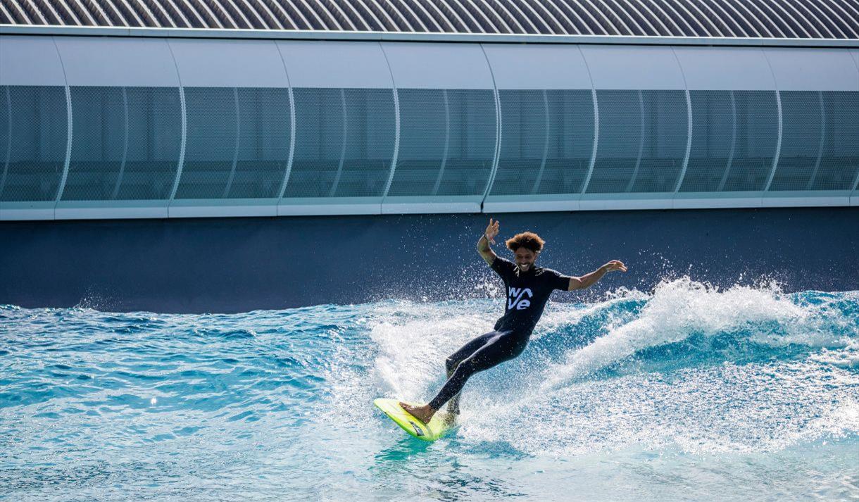 Person surfing at The Wave