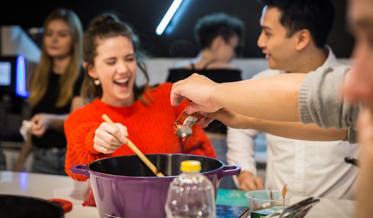 People enjoying a cooking class