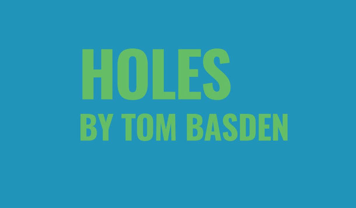 Holes by Tom Basden in green writing on a teal background