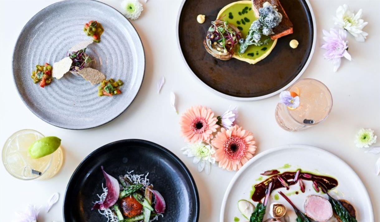 4 plates of food with a spring theme