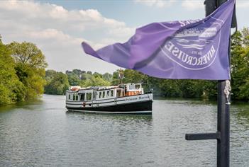 View of Princess Marina cruising on the River Thames