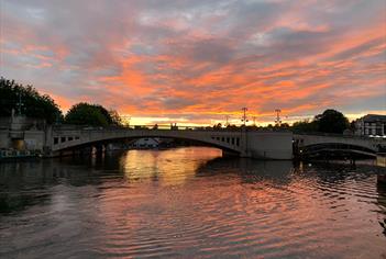 View of Caversham Bridge at sunset.