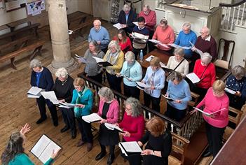 A choir singing in John Wesley's New Room